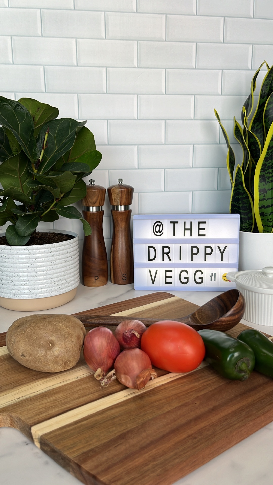 The Drippy Vegg kitchen sign with fresh produce